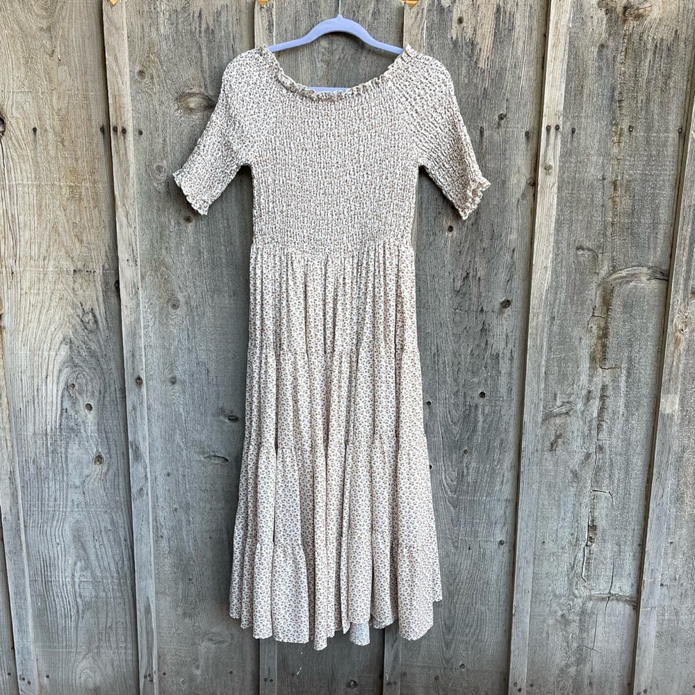 White with tan floral dress